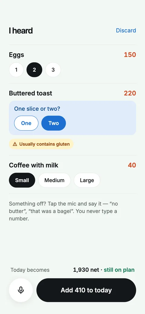 The I heard screen listing eggs, buttered toast and coffee with milk, each with portion chips to confirm